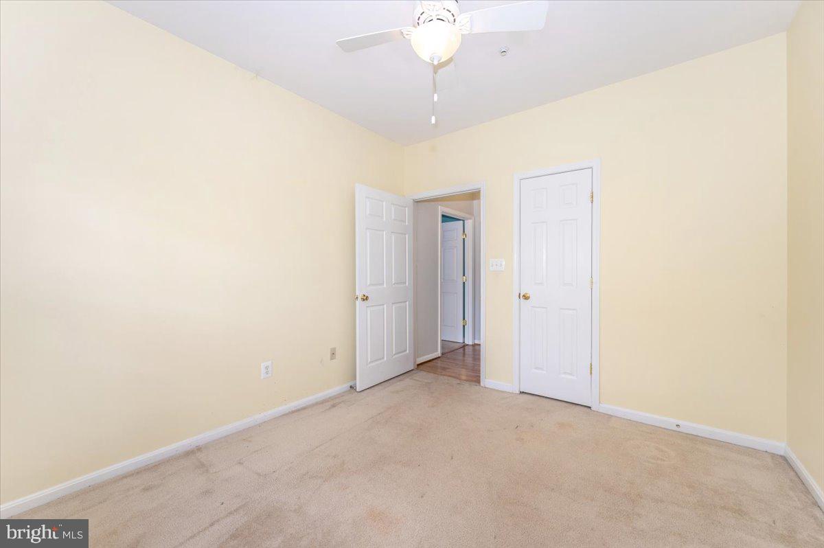 1683 Fallowfield Court Crofton, MD 21114 - Photo 28 of 36 a view of a room with a ceiling fan