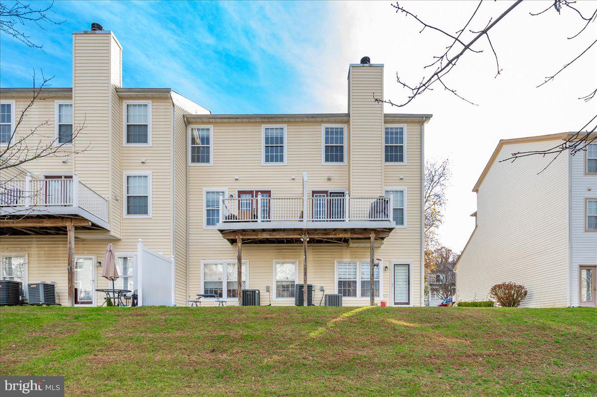 1683 Fallowfield Court Crofton, MD 21114 - Photo 30 of 36 a view of a white house with a swimming pool