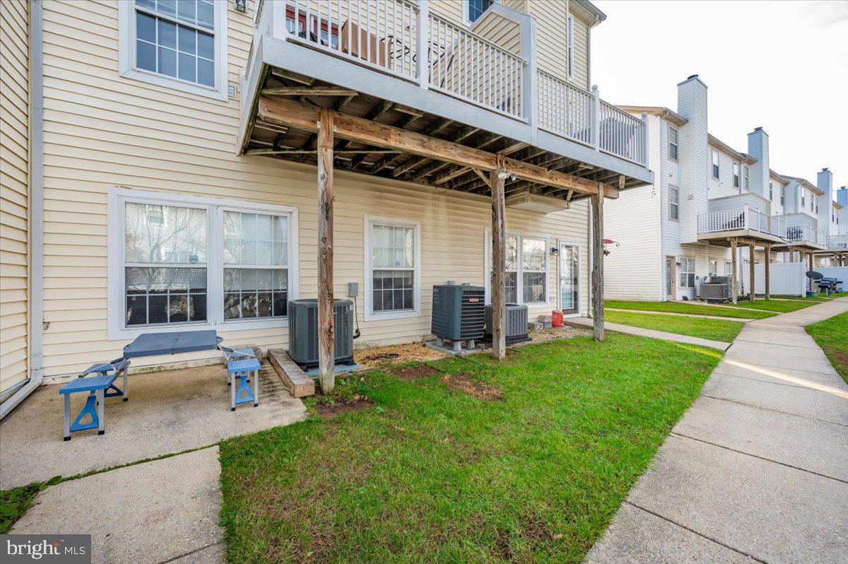 1683 Fallowfield Court Crofton, MD 21114 - Photo 32 of 36 a view of a house with backyard porch and sitting area