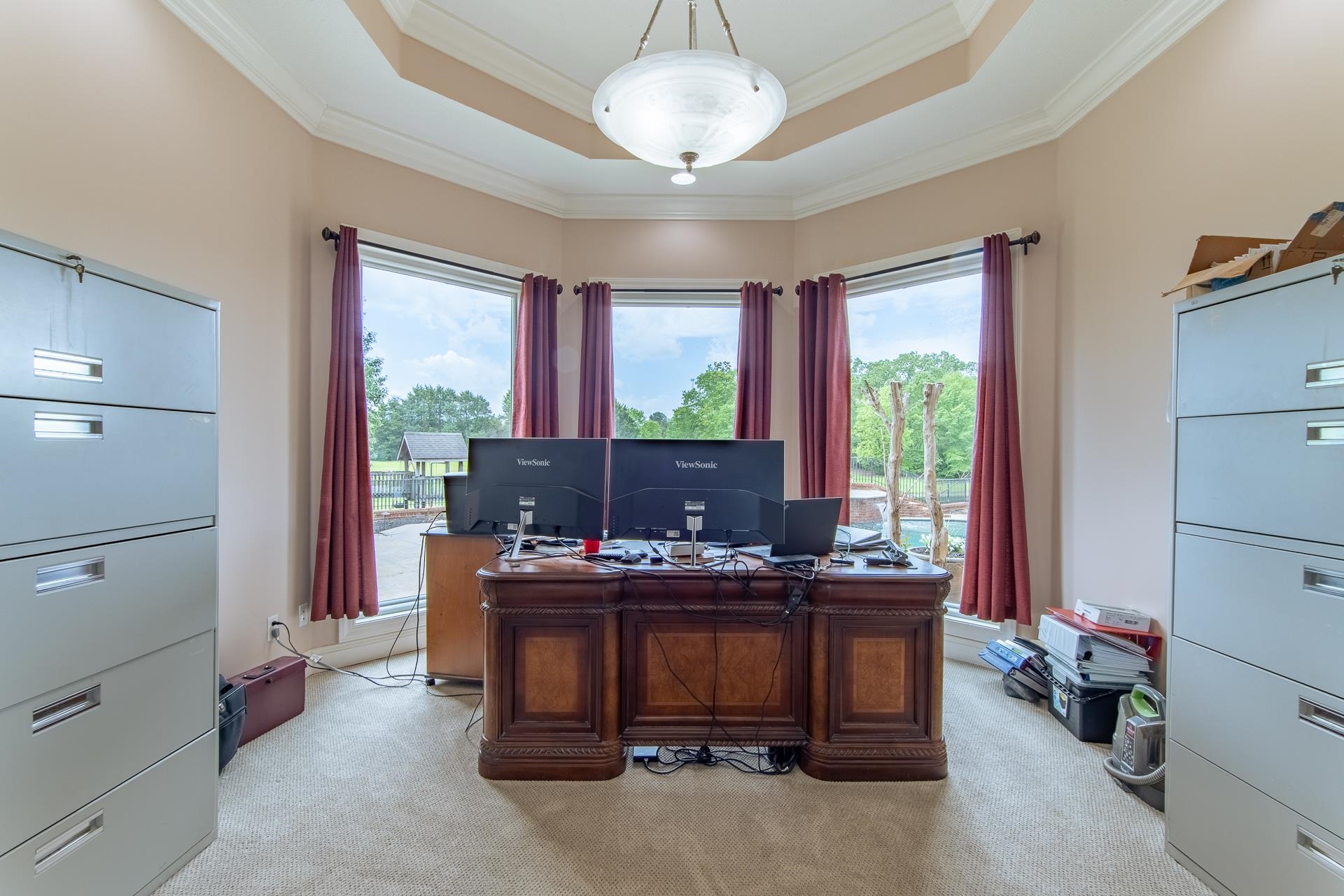 4265 Charlie Pounds Road Stantonville, TN 38379 - Photo 20 of 40 a view of a workspace with furniture and a window