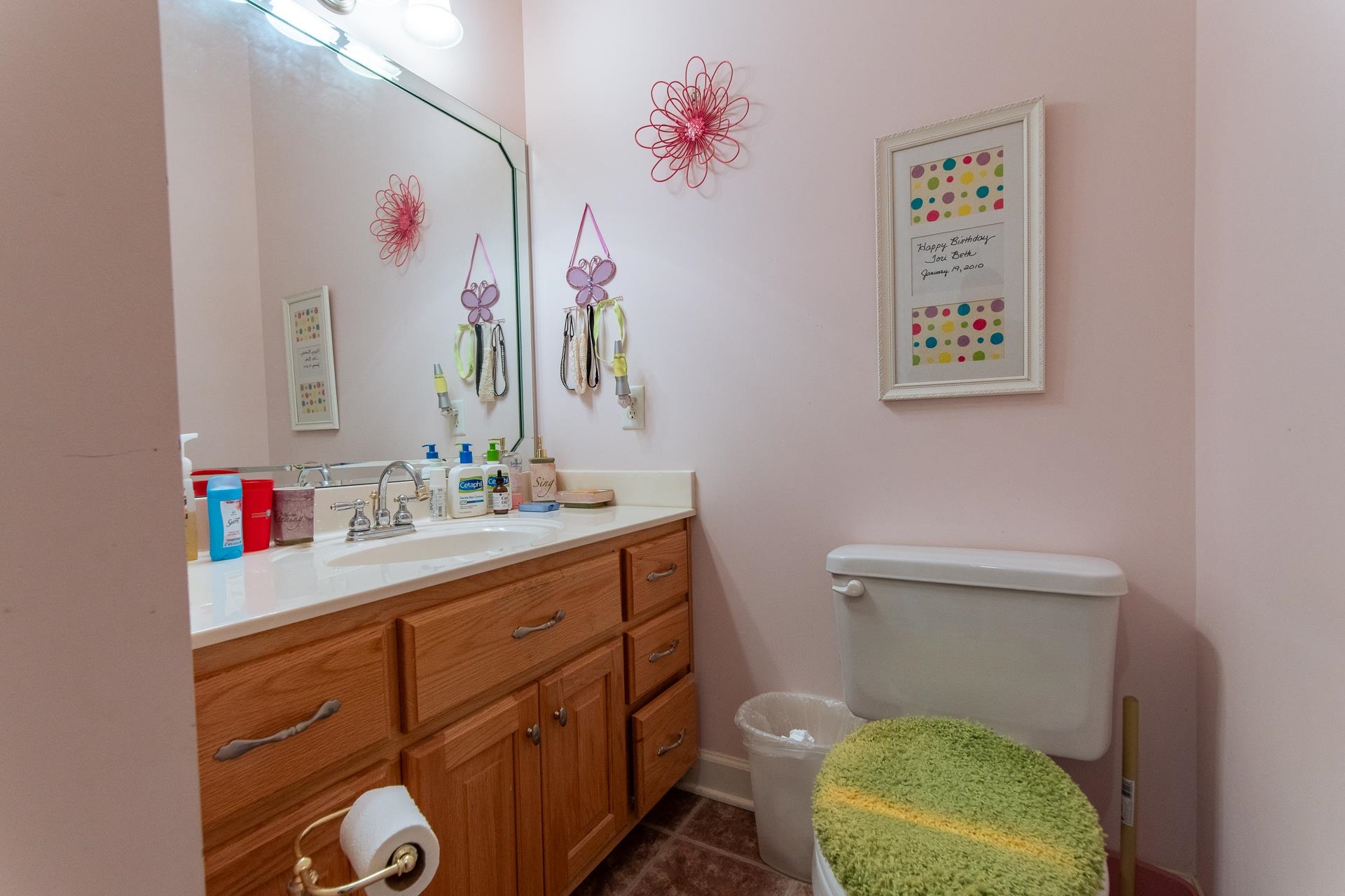 4265 Charlie Pounds Road Stantonville, TN 38379 - Photo 24 of 40 a bathroom with a toilet a sink and a mirror