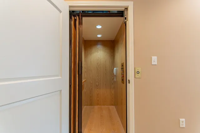 a room with furniture and a large window