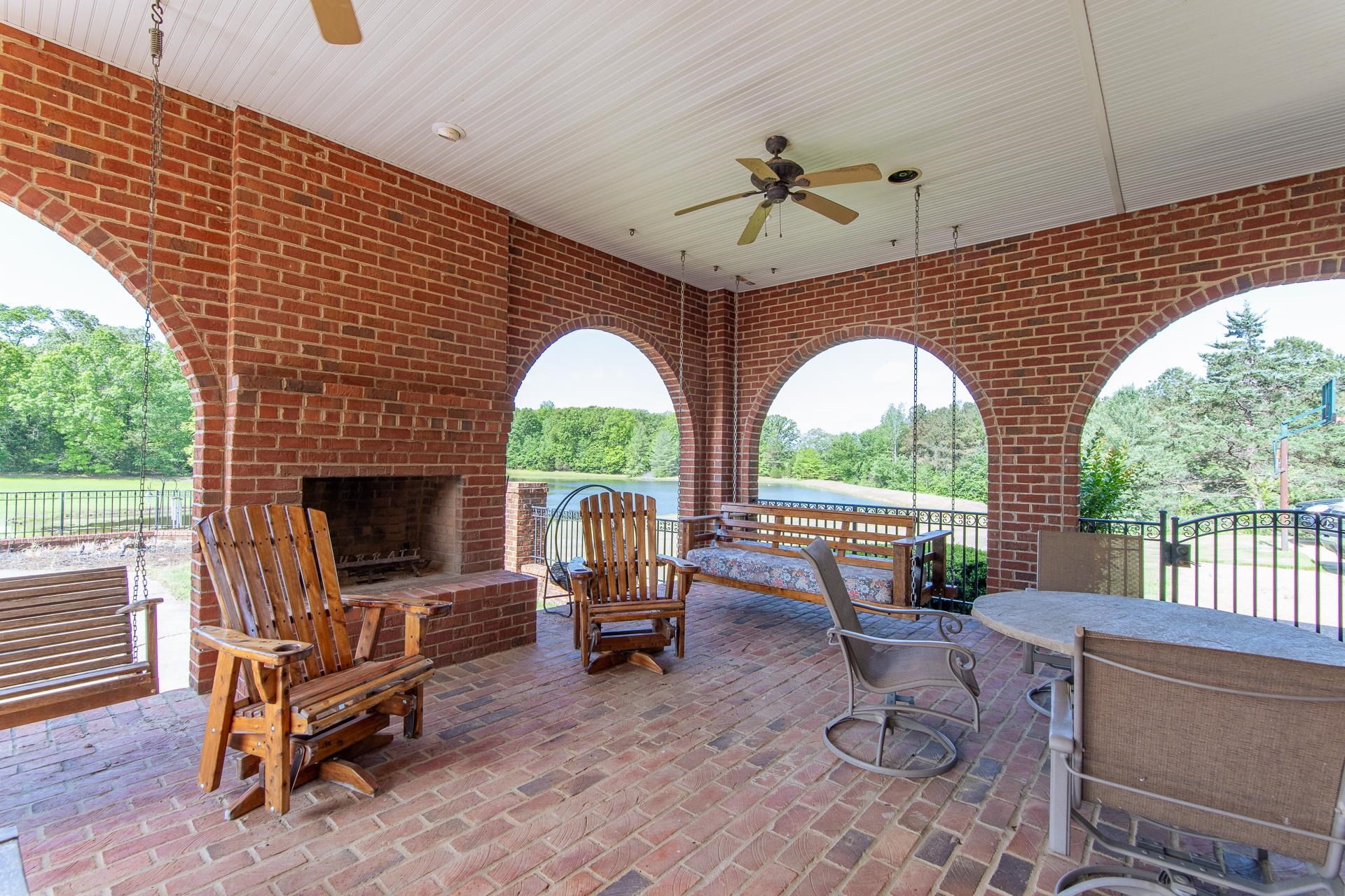 4265 Charlie Pounds Road Stantonville, TN 38379 - Photo 36 of 40 a living room with furniture a fireplace and a large window