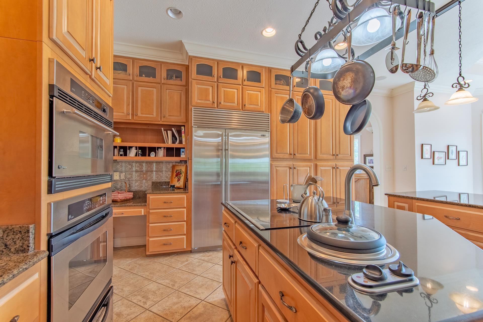 4265 Charlie Pounds Road Stantonville, TN 38379 - Photo 4 of 40 a kitchen with stainless steel appliances granite countertop a stove and a sink