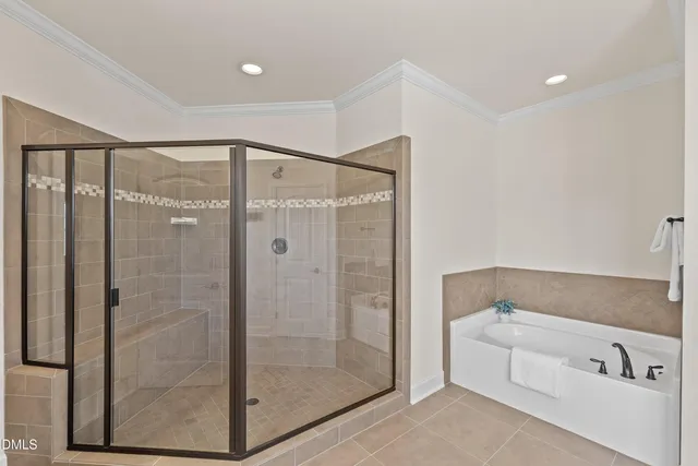 a building outdoor space with patio furniture and potted plants