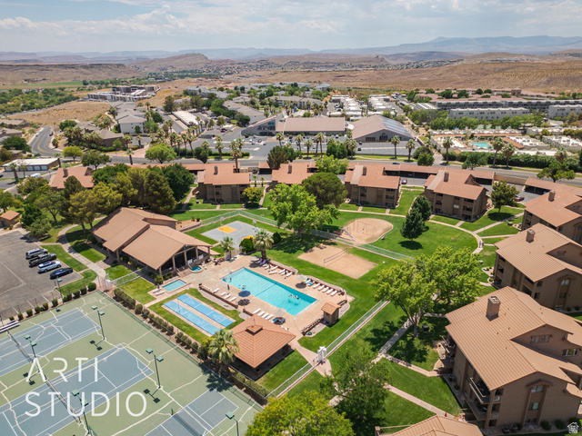 860 South Village Road, Unit A6 St. George, UT 84770 - Photo 34 of 41 Aerial overview of property's location featuring a mountain backdrop and a pool area