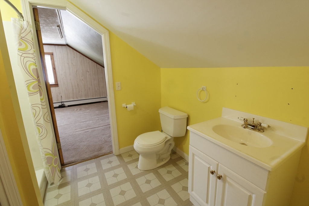 100 Ridge Street Fall River, MA 02721 - Photo 18 of 22 a bathroom with a sink and a toilet