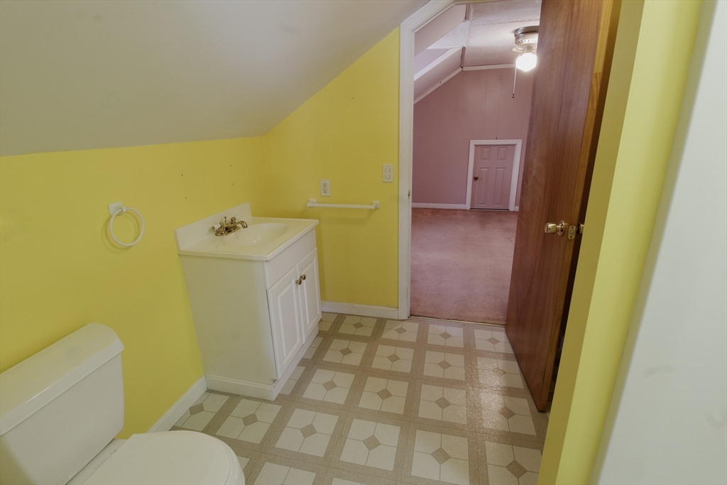 100 Ridge Street Fall River, MA 02721 - Photo 19 of 22 a bathroom with a sink a toilet and a shower