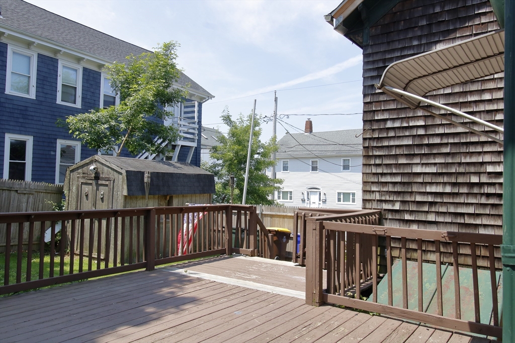 100 Ridge Street Fall River, MA 02721 - Photo 4 of 22 a view of a deck with furniture