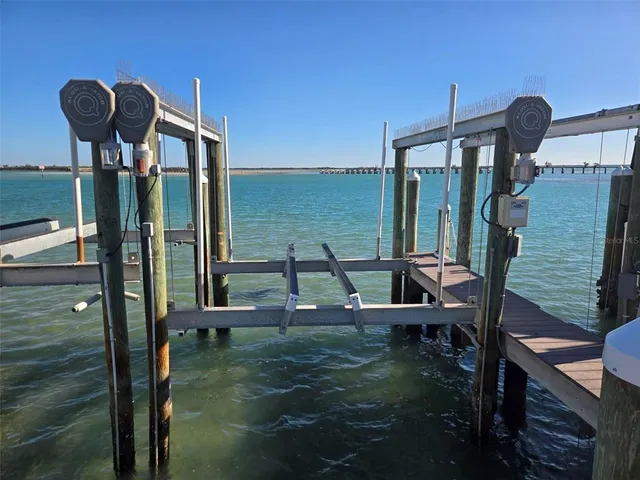 a balcony with view of swimming pool