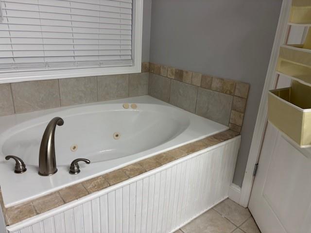 50 Blue Grass Way Oxford, GA 30054 - Photo 18 of 36 a bathroom with a bathtub