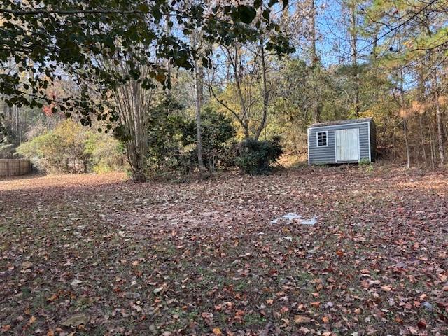 50 Blue Grass Way Oxford, GA 30054 - Photo 29 of 36 a backyard of a house with lots of green space