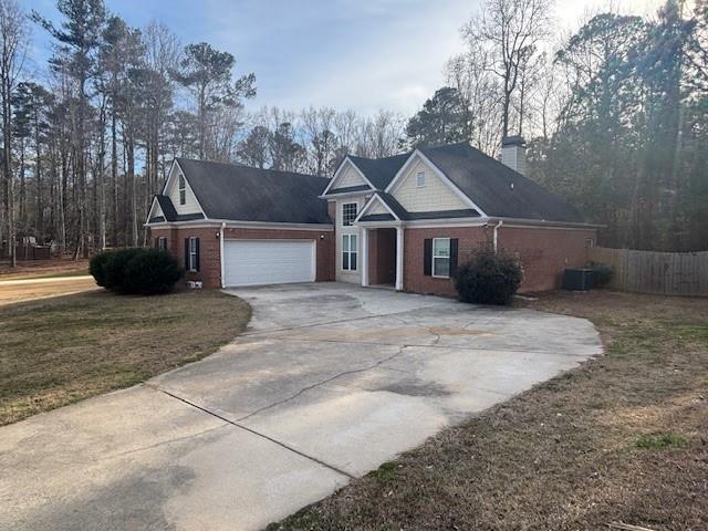 50 Blue Grass Way Oxford, GA 30054 - Photo 36 of 36 a view of a house with a snow in a yard