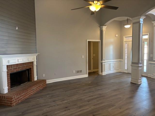 50 Blue Grass Way Oxford, GA 30054 - Photo 4 of 36 a view of an empty room with wooden floor and a fireplace