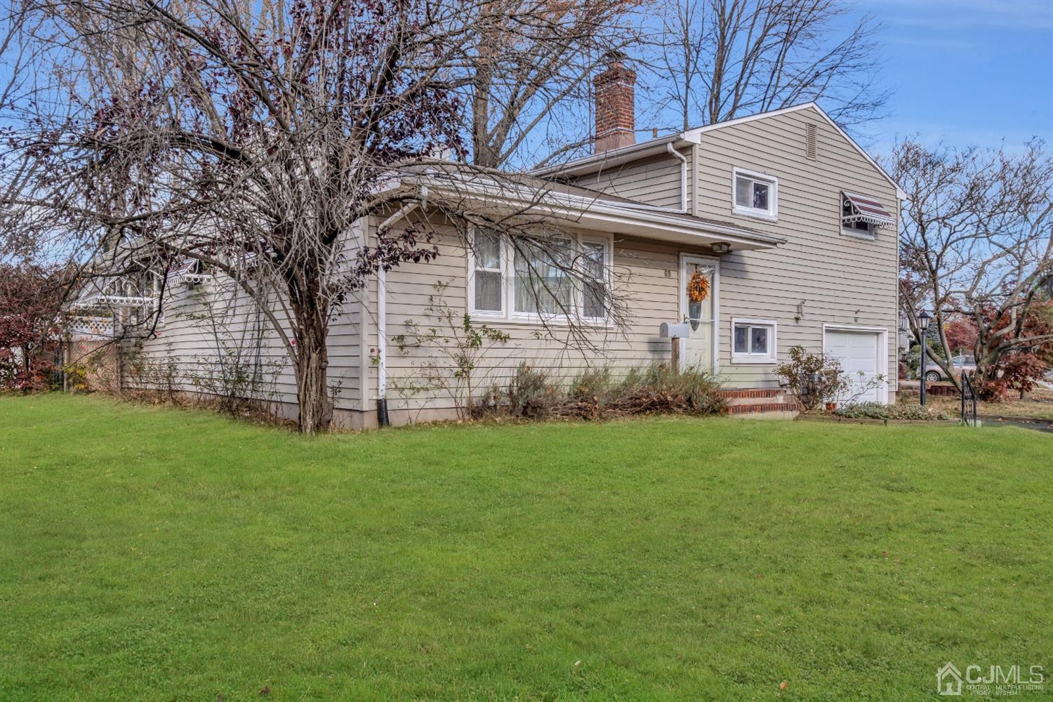 69 Stony Road Edison, NJ 08817 - Photo 2 of 33 a view of a house with a yard