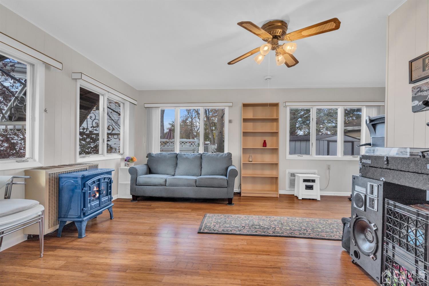 69 Stony Road Edison, NJ 08817 - Photo 16 of 33 a living room with furniture and a large window