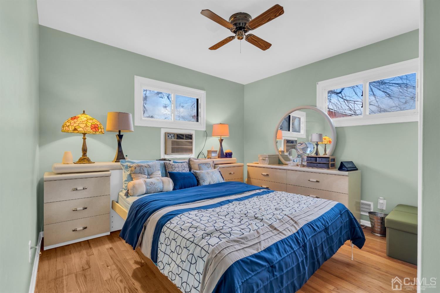 69 Stony Road Edison, NJ 08817 - Photo 23 of 33 a bedroom with a bed and a dresser in it