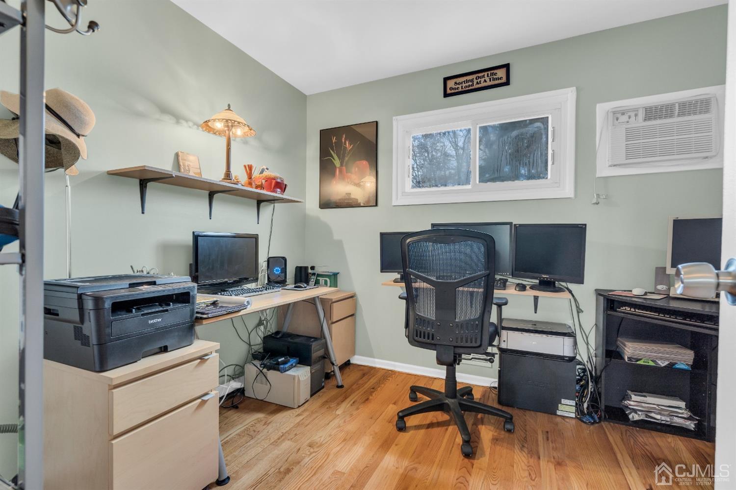 69 Stony Road Edison, NJ 08817 - Photo 25 of 33 a view of a workspace with furniture and a window