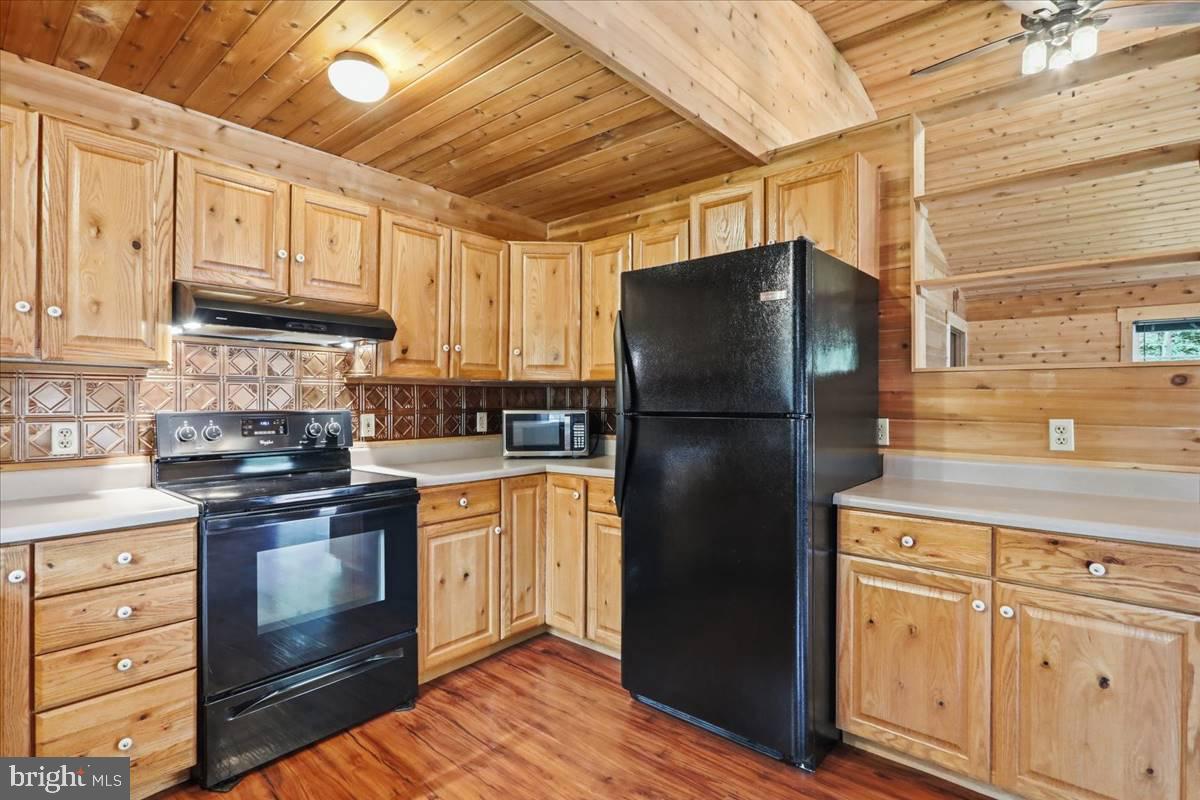 24105 Raven Rock Road Smithsburg, MD 21783 - Photo 8 of 51 Rustic charm in a cozy kitchen.