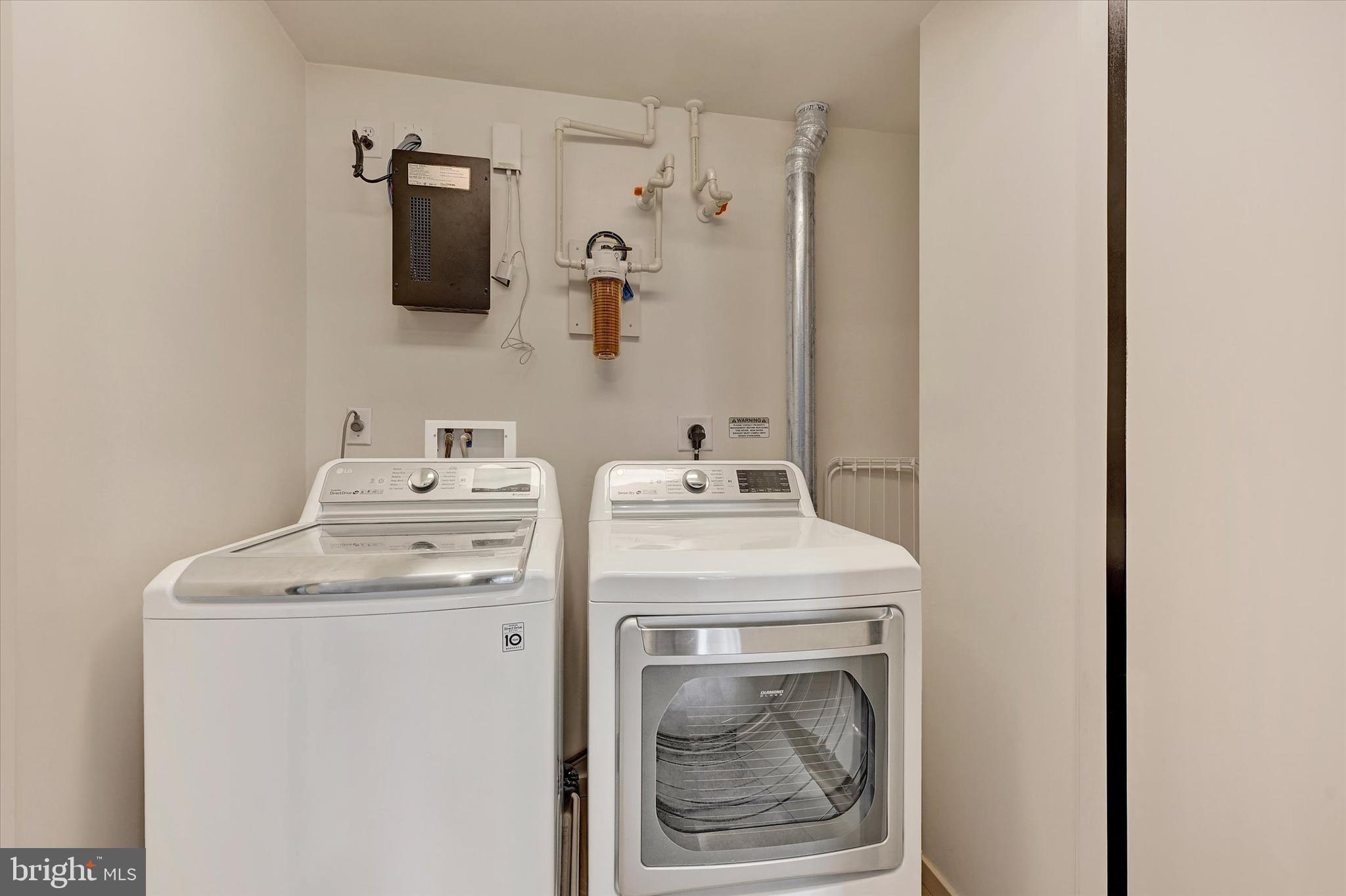 1200 Steuart Street, Unit 1913 Baltimore, MD 21230 - Photo 62 of 94 Convenient upper Laundry with full-size units.