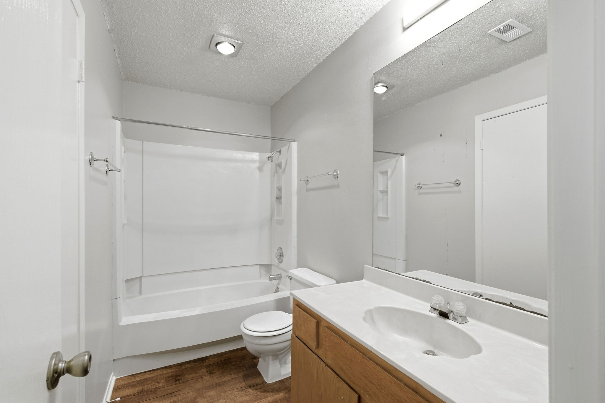 2511 Howellwood Way, Unit A Austin, TX 78748 - Photo 13 of 16 a bathroom with a sink toilet tub and shower