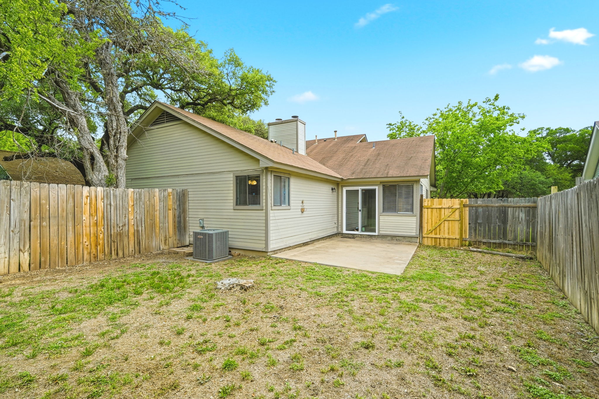 2511 Howellwood Way, Unit A Austin, TX 78748 - Photo 14 of 16 a house view with a garden space