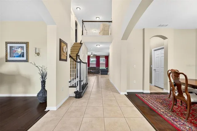 a living room with furniture and a table