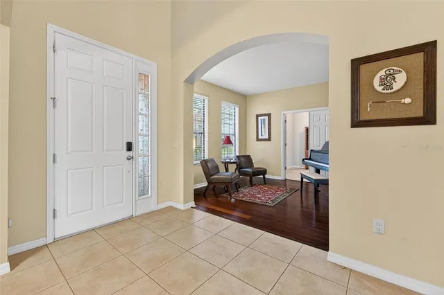 a living room with furniture and a table
