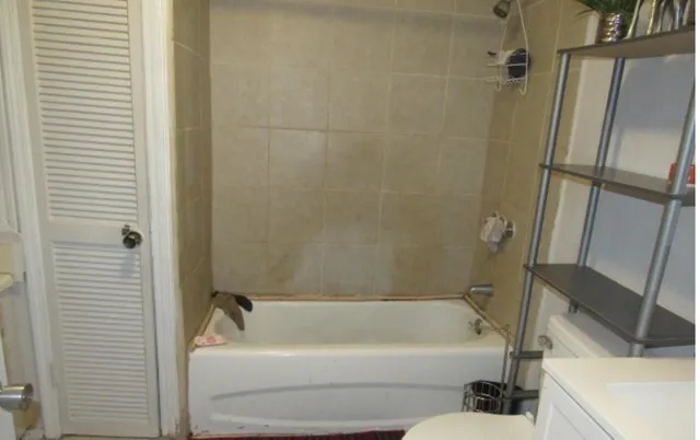 a room with furniture and baby bed