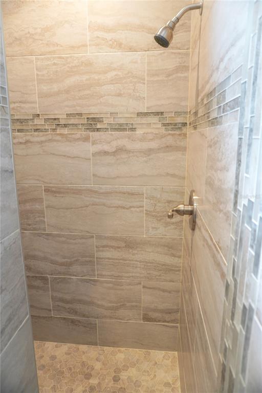 104 163rd Avenue Redington Beach, FL 33708 - Photo 13 of 22 a bathroom with a shower