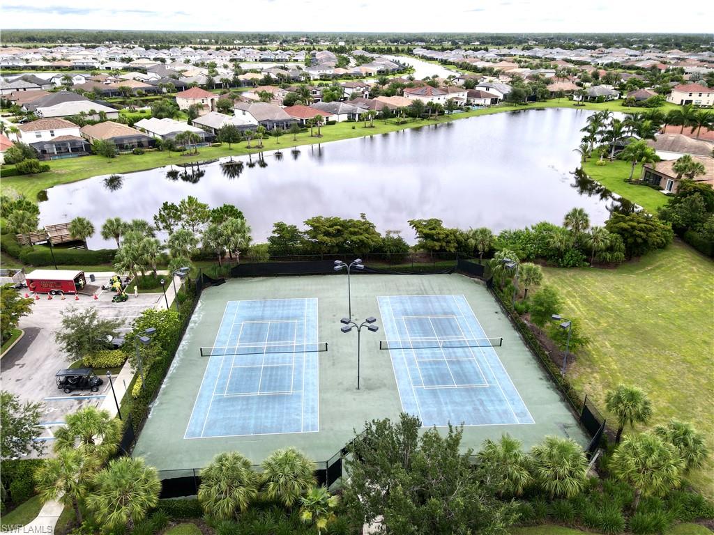 2701 Citrus Street Naples, FL 34120 - Photo 29 of 39 an aerial view of residential houses with outdoor space and lake view