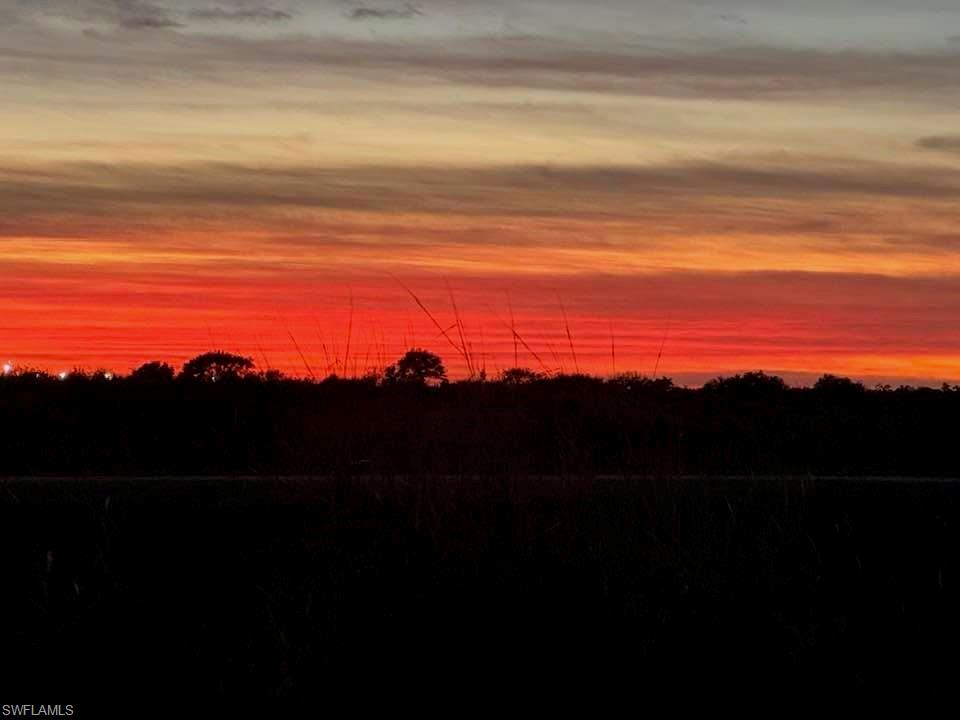 2701 Citrus Street Naples, FL 34120 - Photo 38 of 39 Lanai view of sunset