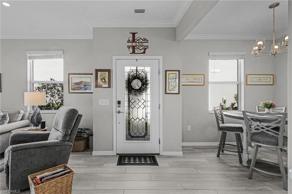 2701 Citrus Street Naples, FL 34120 - Photo 5 of 39 a view of a livingroom with furniture and window