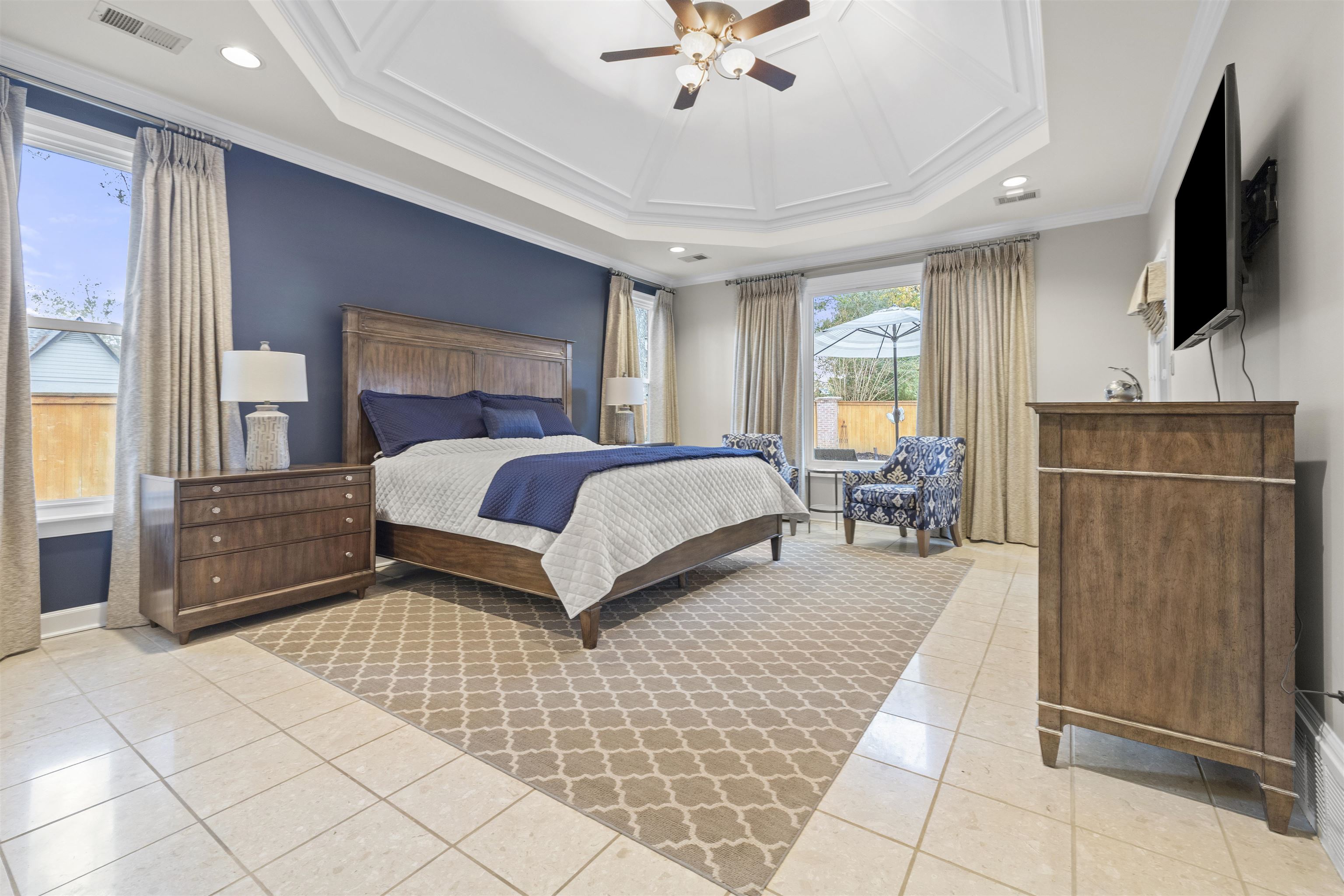 2163 Houston Pass Collierville, TN 38139 - Photo 12 of 30 a bedroom with a bed and a flat screen tv