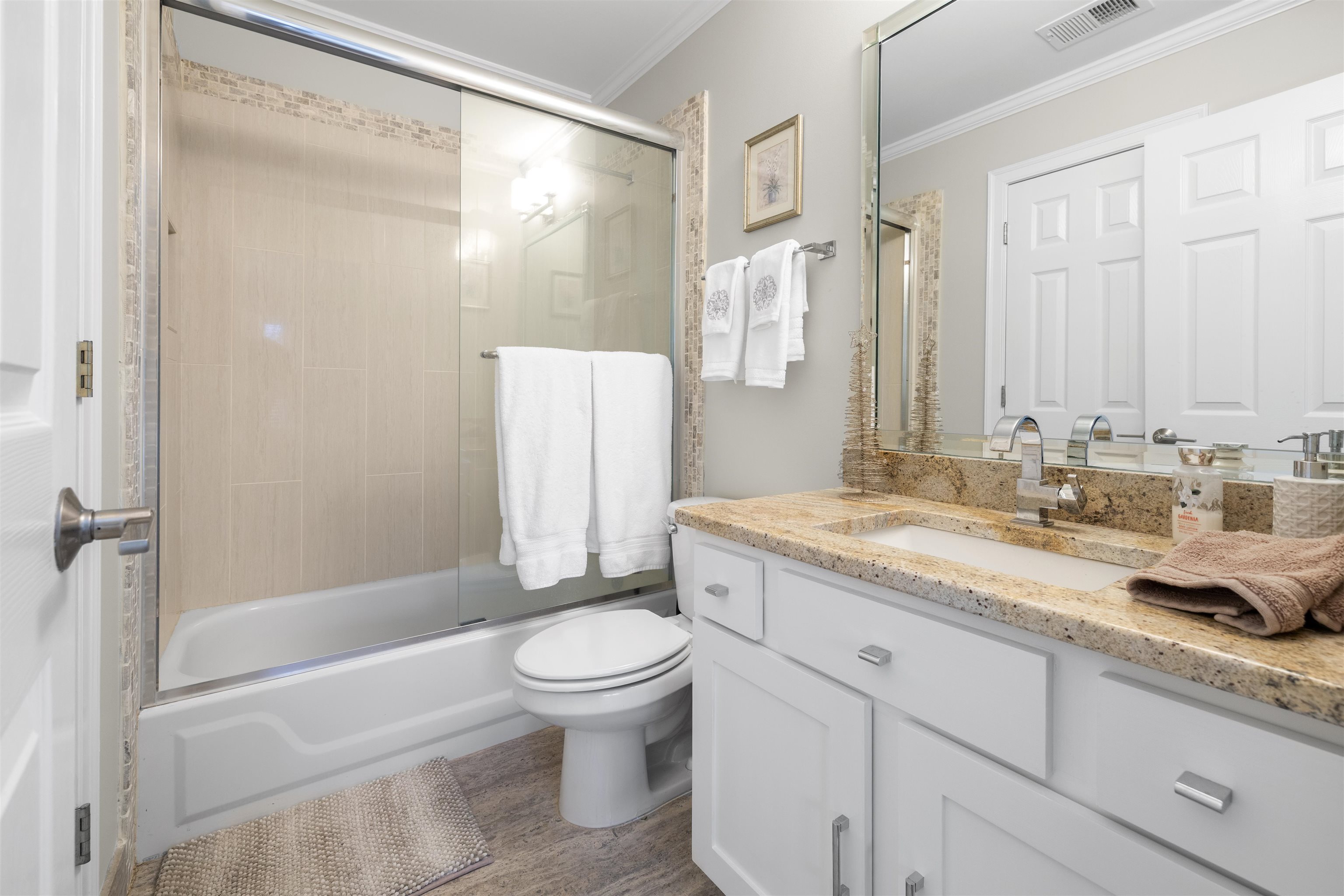 2163 Houston Pass Collierville, TN 38139 - Photo 20 of 30 a bathroom with a granite countertop sink toilet and shower