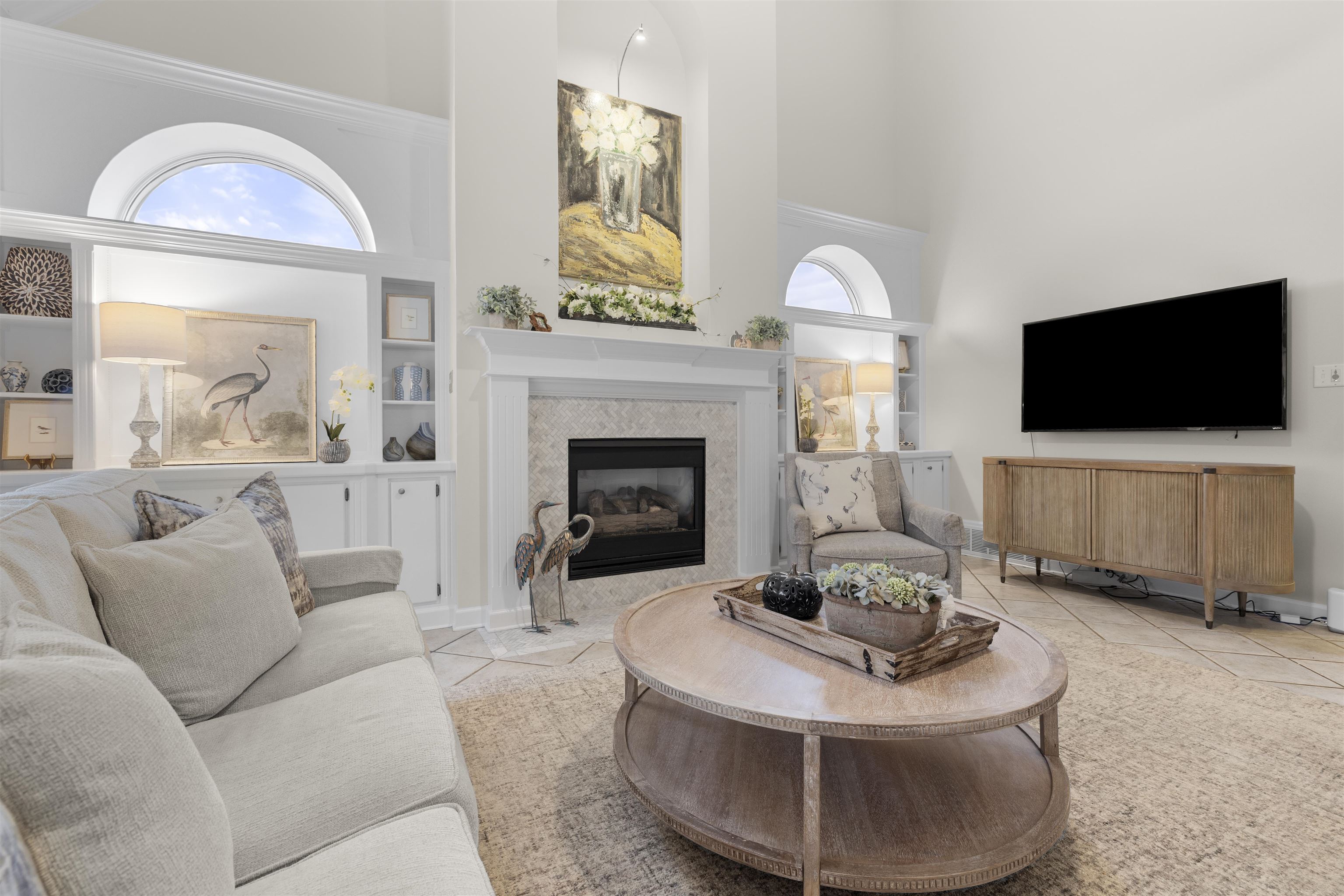 2163 Houston Pass Collierville, TN 38139 - Photo 10 of 30 a living room with furniture a fireplace and a flat screen tv