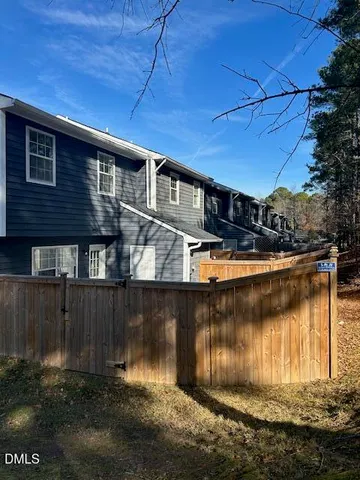 a view of a house with a lake view