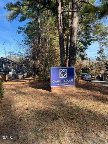 a view of street with parked cars