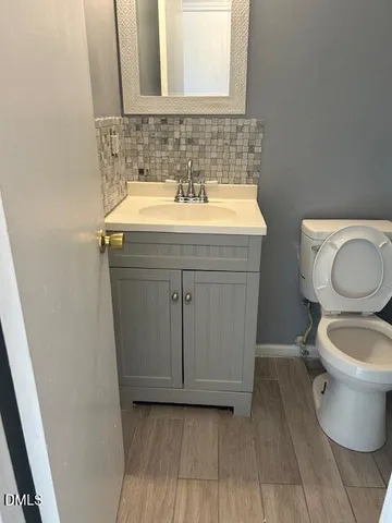 a bathroom with a sink and a toilet