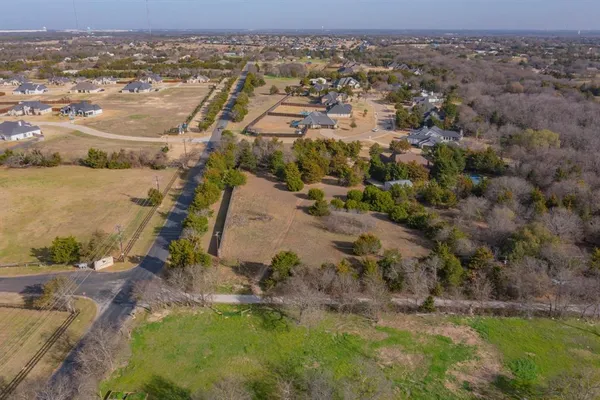 an aerial view of residential house with outdoor space