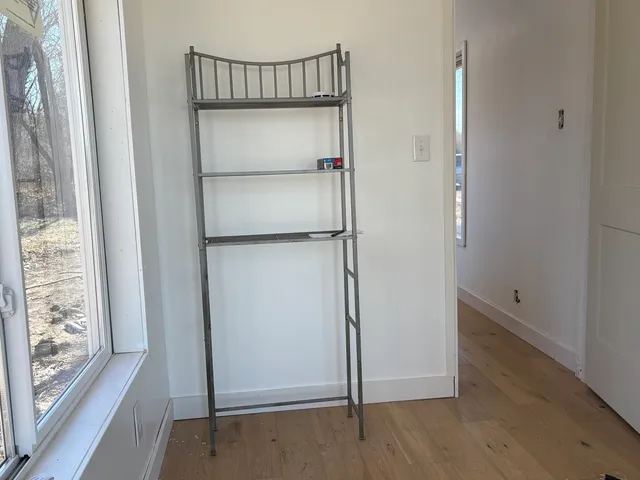 a view of a room and a window