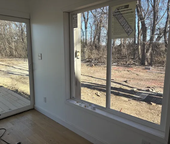 a view of a porch with furniture