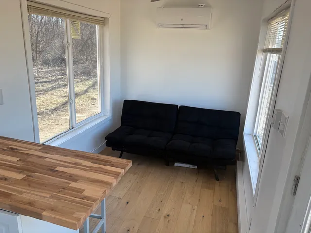 a kitchen with a stove a sink and a refrigerator