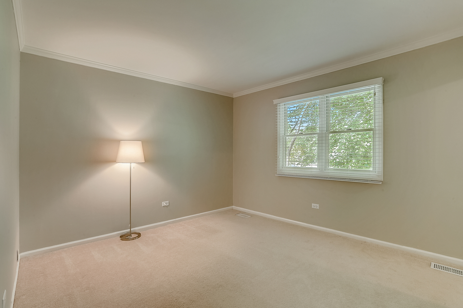 1760 Saddle Hill Road Libertyville, IL 60048 - Photo 17 of 28 an empty room with a window