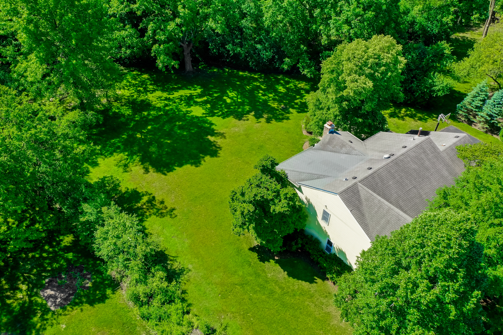 1760 Saddle Hill Road Libertyville, IL 60048 - Photo 22 of 28 an aerial view of residential house with outdoor space and trees all around