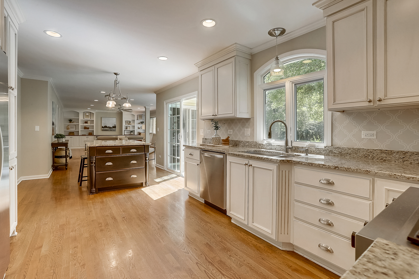 1760 Saddle Hill Road Libertyville, IL 60048 - Photo 7 of 28 a kitchen with granite countertop a sink cabinets and wooden floor