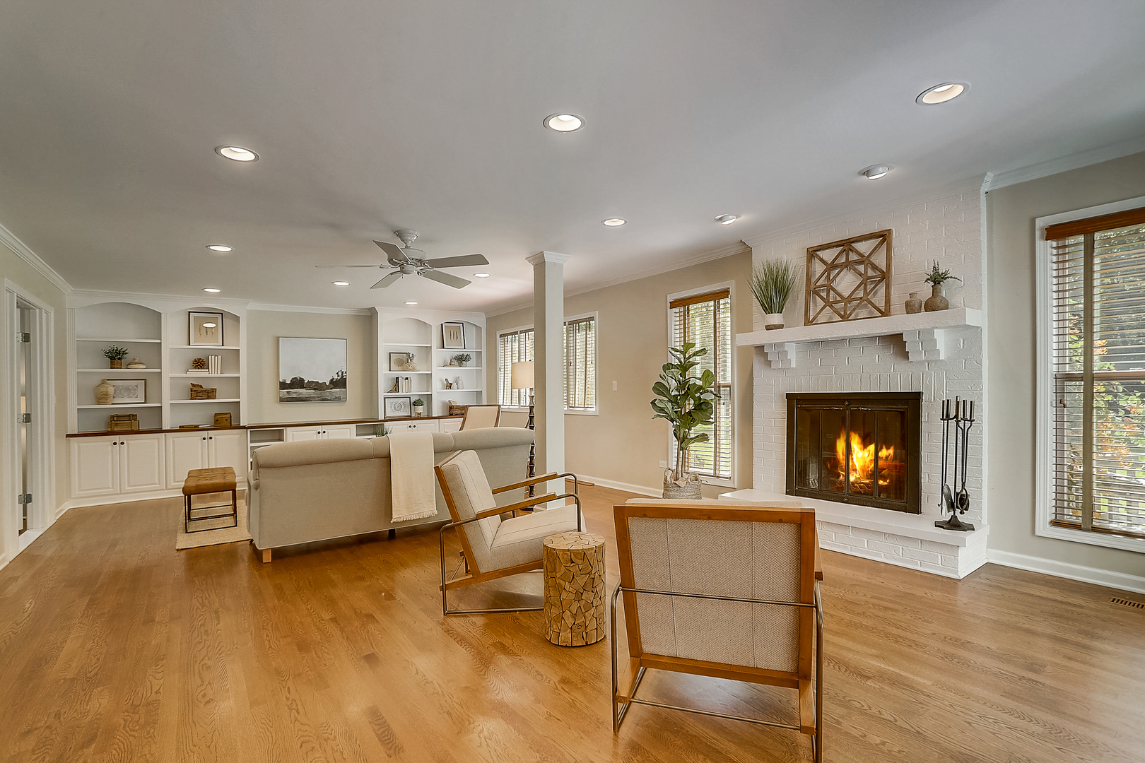 1760 Saddle Hill Road Libertyville, IL 60048 - Photo 8 of 28 a living room with furniture and a fireplace