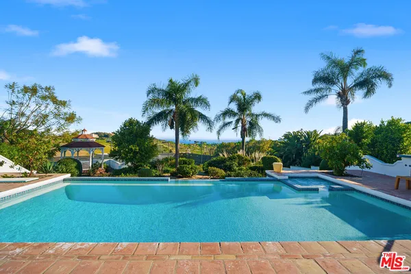 a view of an outdoor space and swimming pool