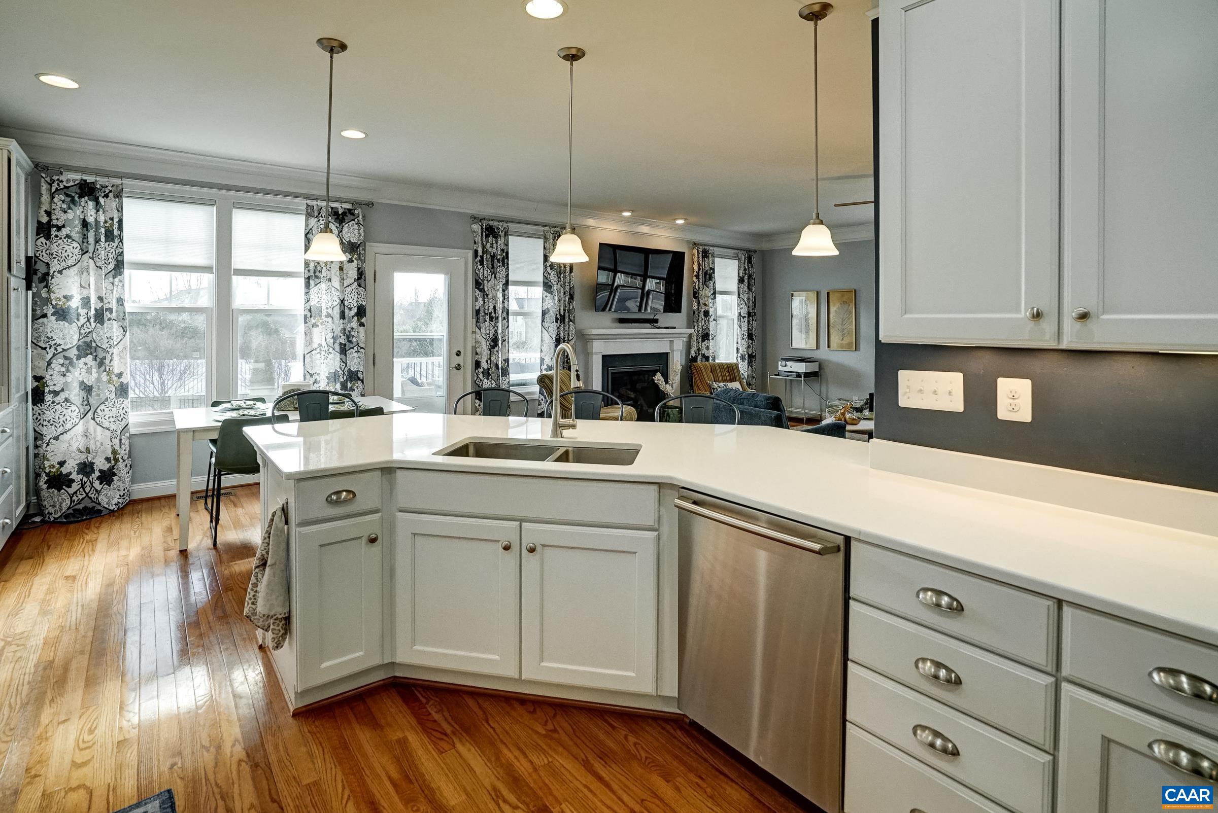 7652 Birchwood Hill Road Crozet, VA 22932 - Photo 11 of 64 a kitchen with a sink window and cabinets