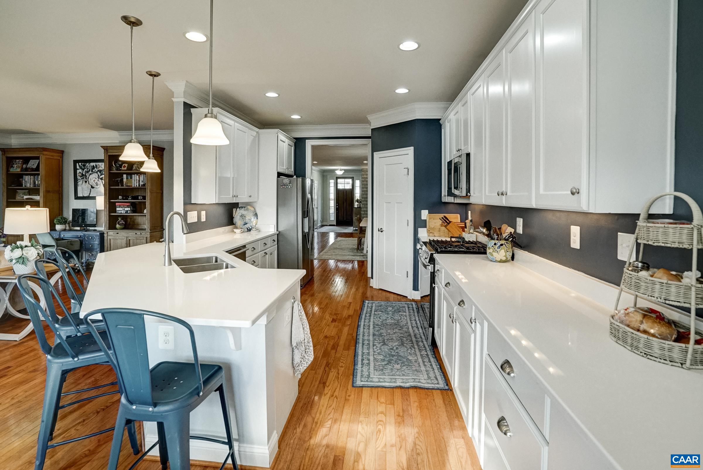 7652 Birchwood Hill Road Crozet, VA 22932 - Photo 14 of 64 Corner pantry with solid shelving offers extra storage.
